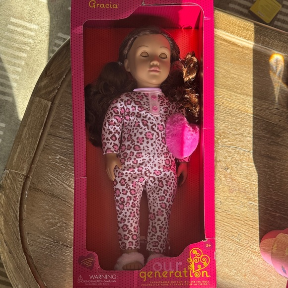 Leopard Print Doll with Brown Hair and Pink Outfit - Picture 2 of 3